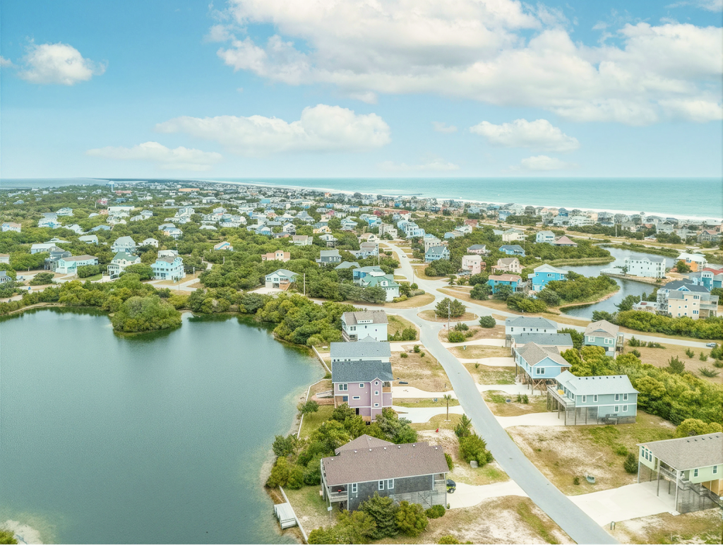 Aerial view of an Outer Banks neighborhood between the sound and the Atlantic Ocean